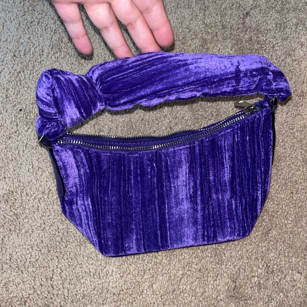 A new Day purple velvet purse